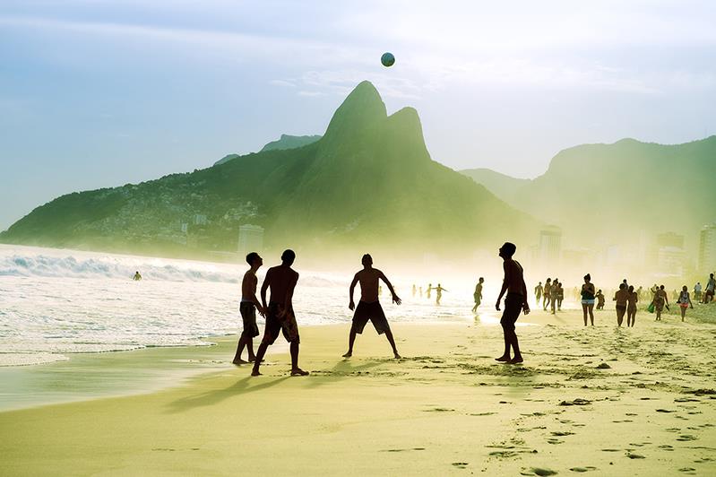 Brazilians playing football (Shutterstock)