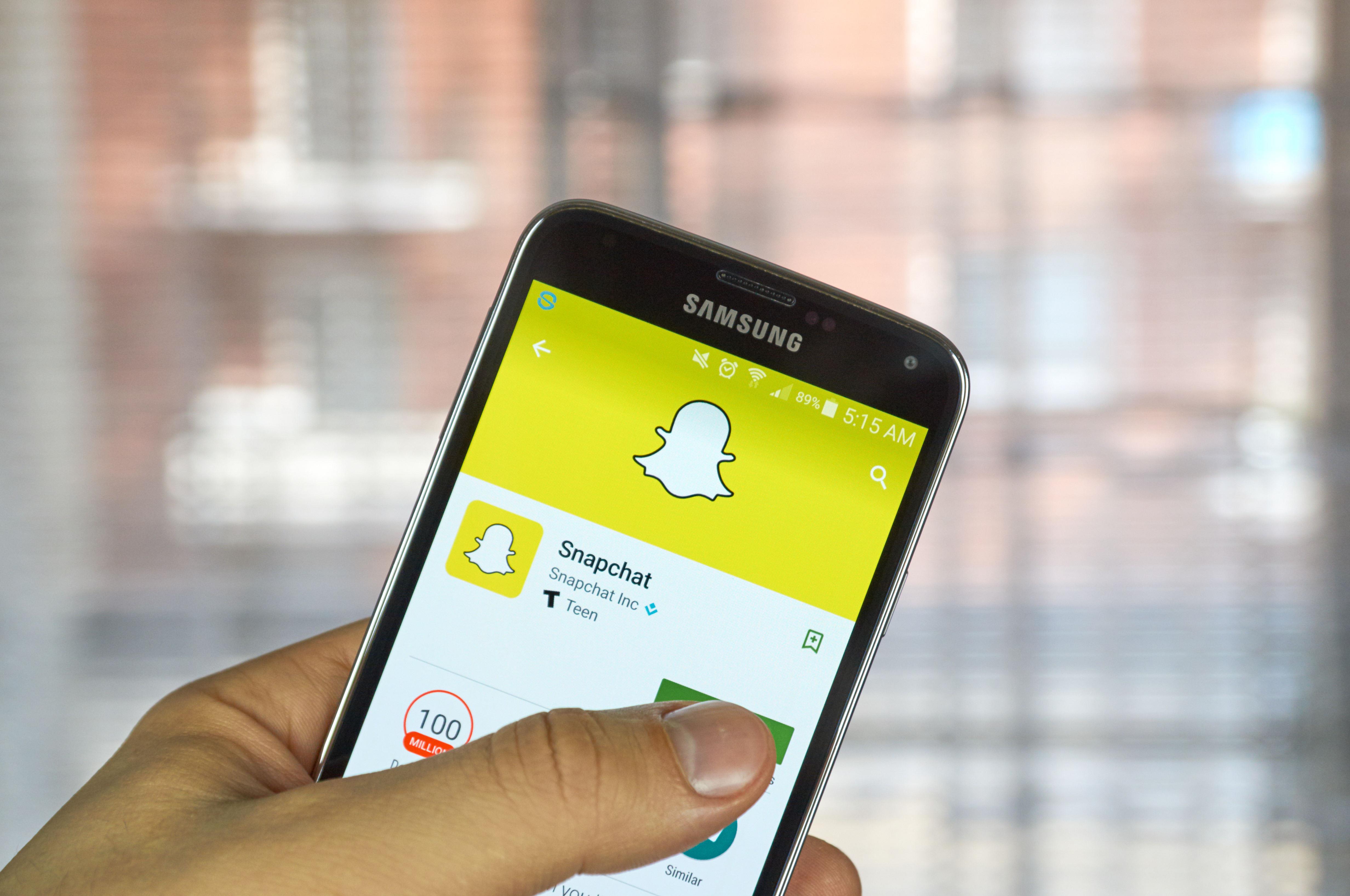 Snapchat on smartphone ()